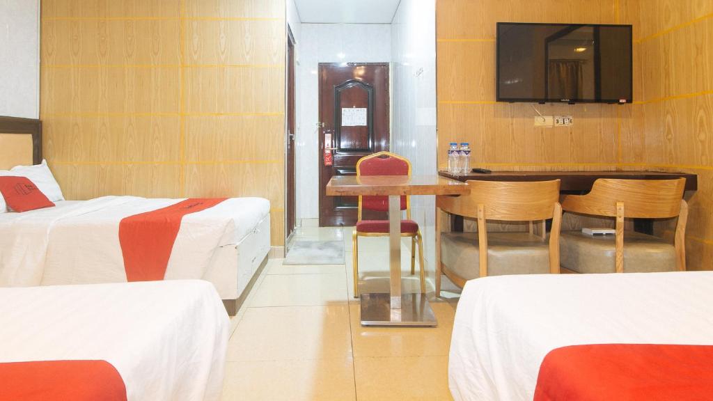 Postel nebo postele na pokoji v ubytování RedDoorz at Winter Hotel Araneta
