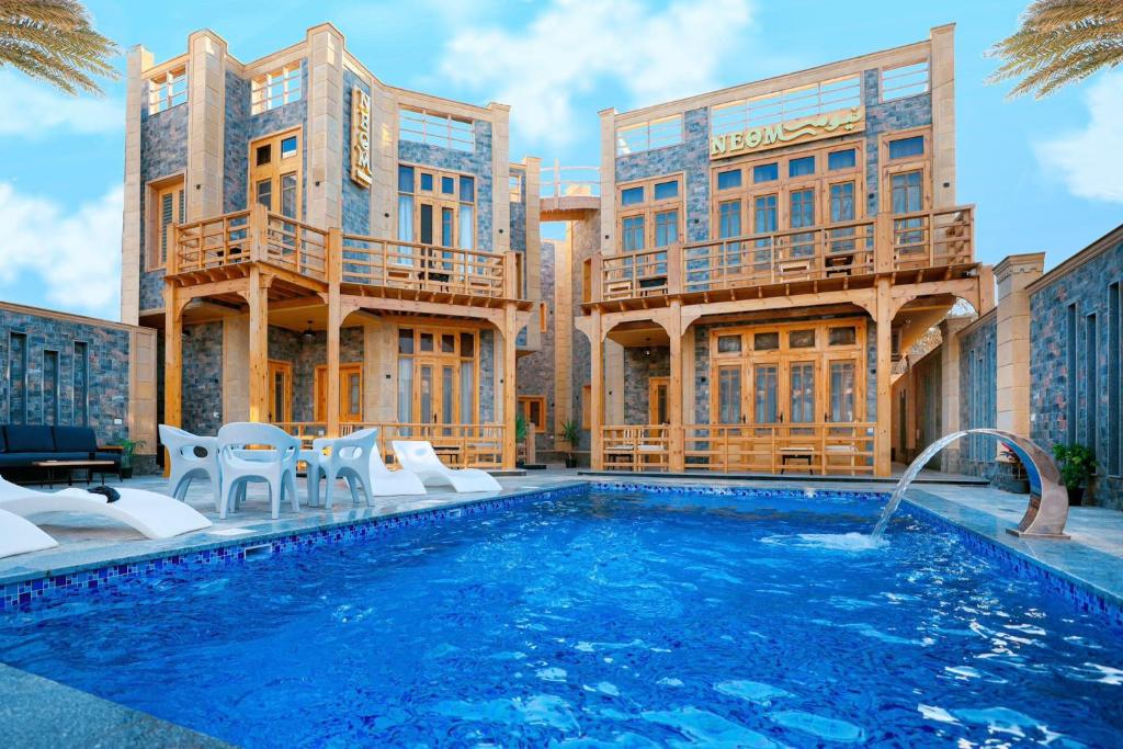 Bassein majutusasutuses NEOM DAHAB - - - - - - - - - - - Your new hotel in Dahab with private beach või selle lähedal