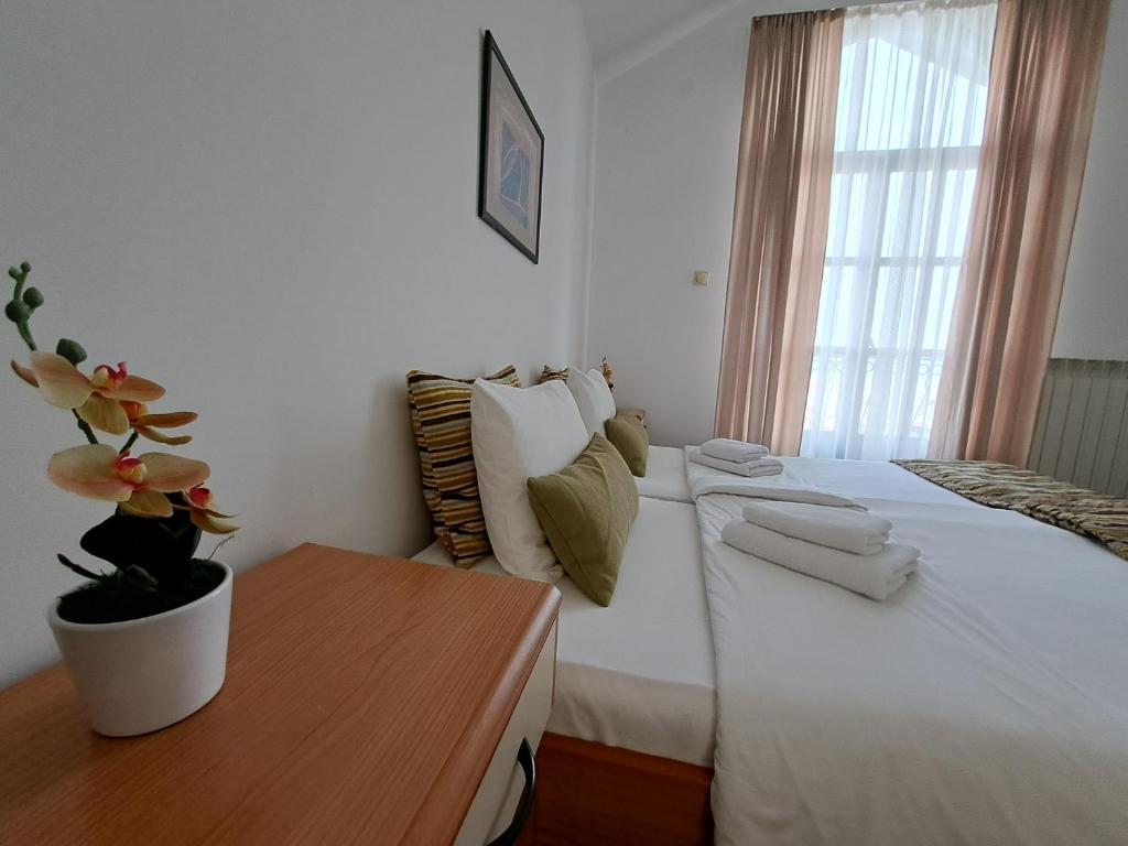 Postel nebo postele na pokoji v ubytování Hotel Marica