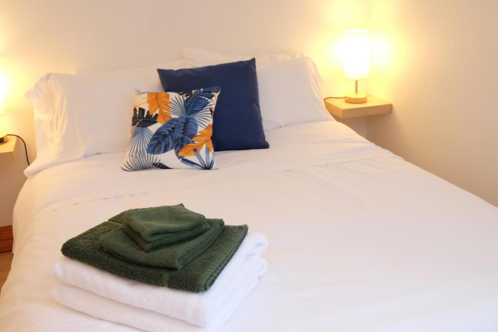 Llit o llits en una habitació de Auberge Mélilot