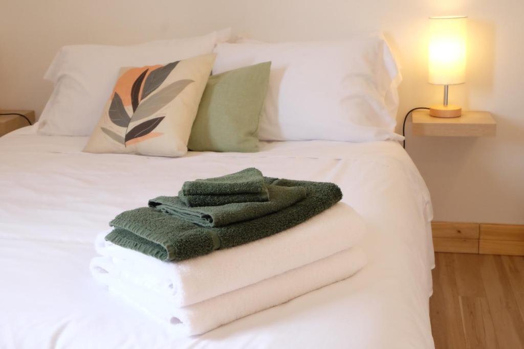 Llit o llits en una habitació de Auberge Mélilot