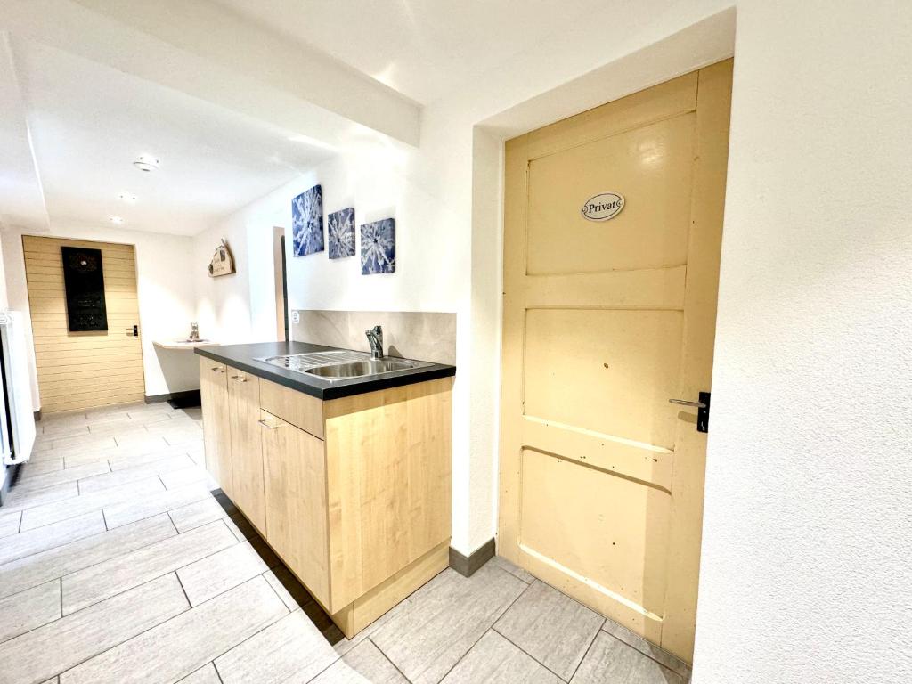 Kuchyň nebo kuchyňský kout v ubytování Haus Chalet Arnika