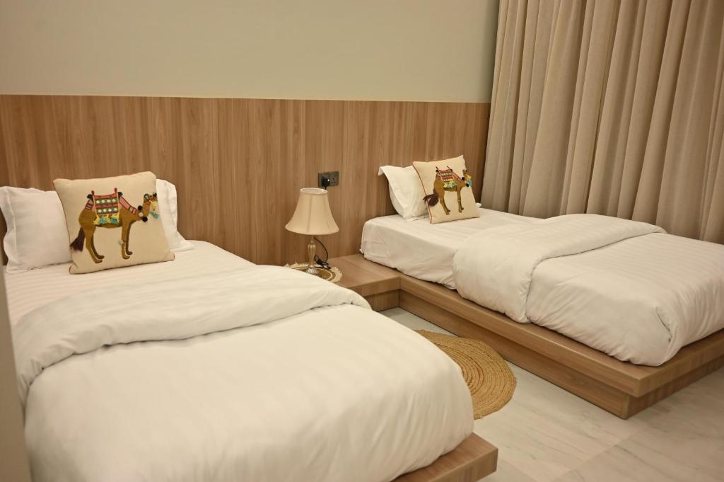 Postel nebo postele na pokoji v ubytování Damas Resort