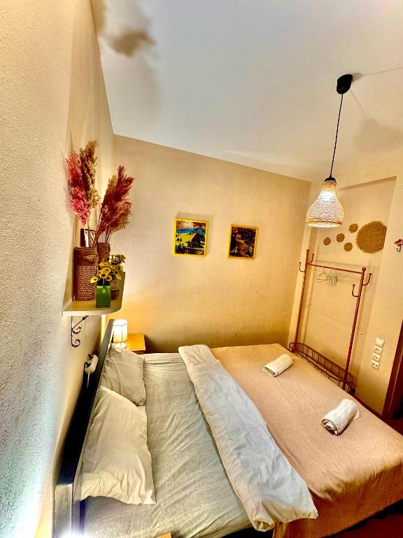 Postel nebo postele na pokoji v ubytování Sky Guest House