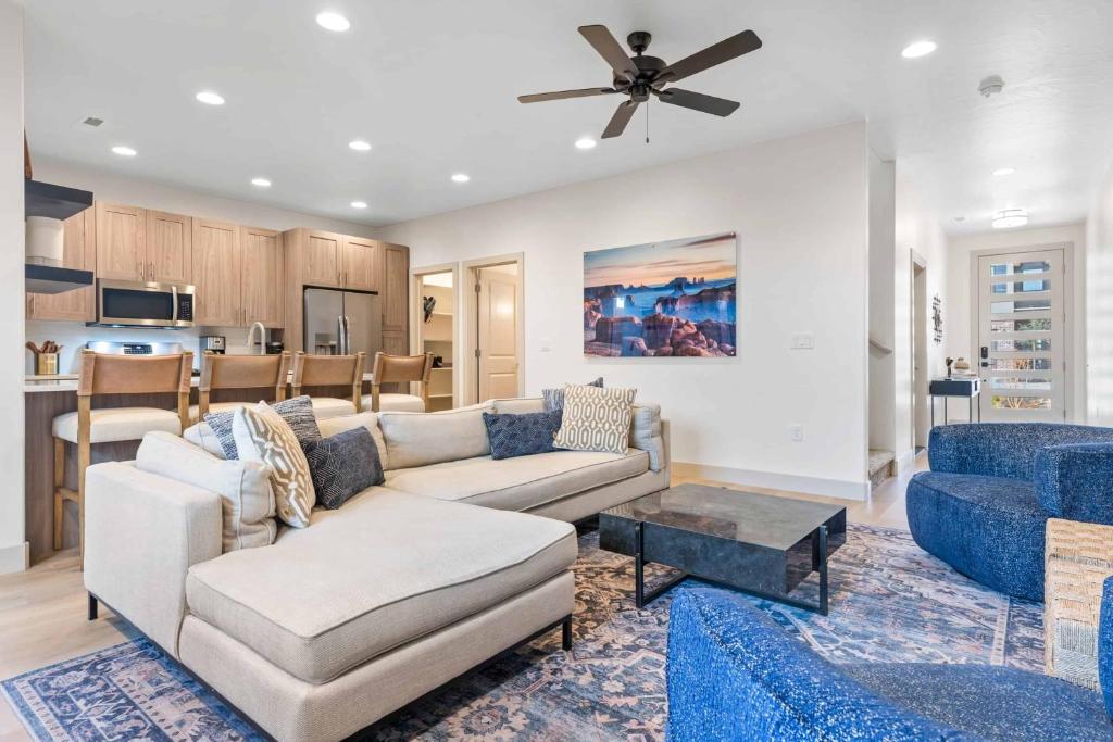 a living room with a couch and a table at Fairway Getaway #55 townhouse in Santa Clara