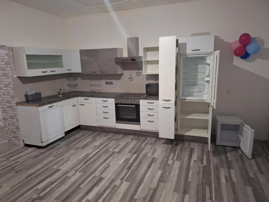 Kuchyň nebo kuchyňský kout v ubytování Ferienapartment Neunkirchen