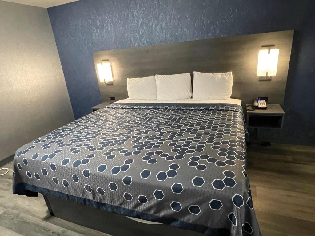 Postel nebo postele na pokoji v ubytování The Wayne Inn