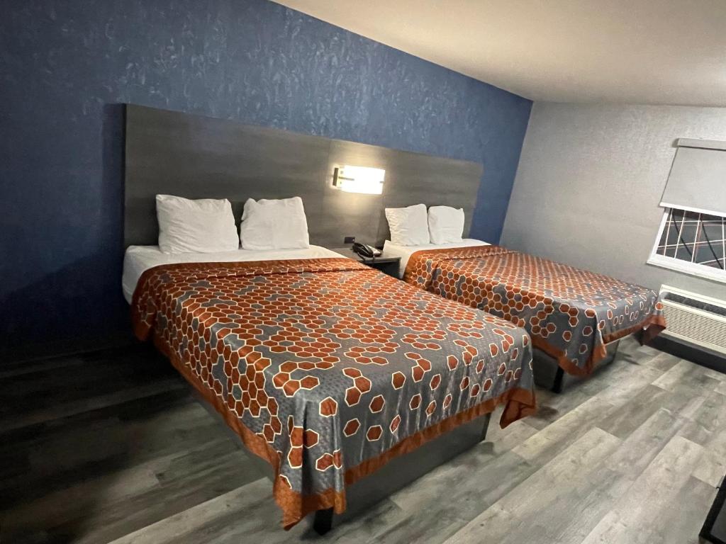 Postel nebo postele na pokoji v ubytování The Wayne Inn