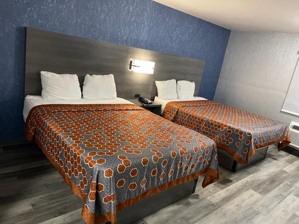 Postel nebo postele na pokoji v ubytování The Wayne Inn