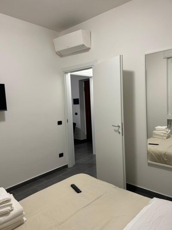 Postel nebo postele na pokoji v ubytování Caprotti 6