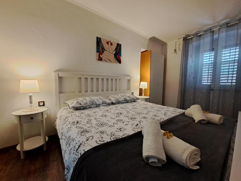 Postel nebo postele na pokoji v ubytování Apartman Darija