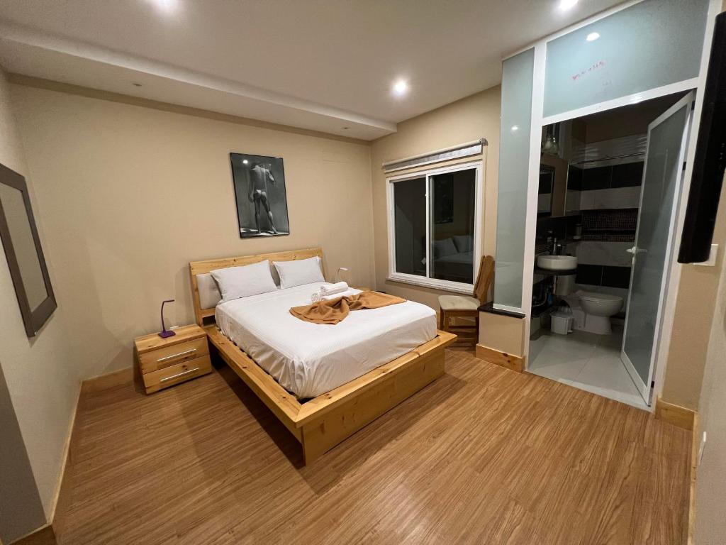 Postel nebo postele na pokoji v ubytování Spencer Residencial QUARTOS