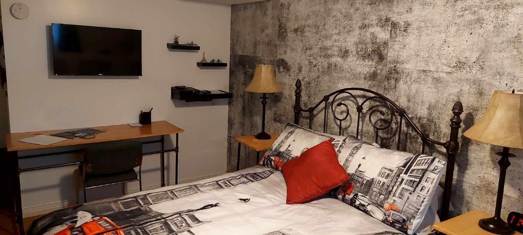 TV a/nebo společenská místnost v ubytování Gîte Au p'tit bonheur B&B