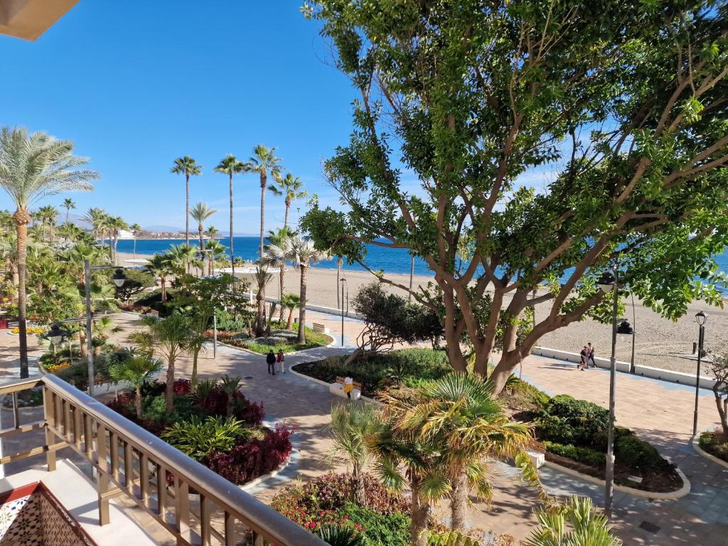 a view of the beach from the balcony of a resort at Estepona playa in Estepona