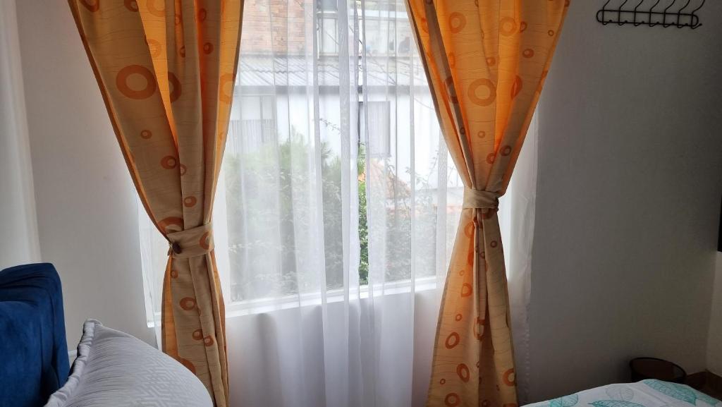 Postel nebo postele na pokoji v ubytování Casa Dohko