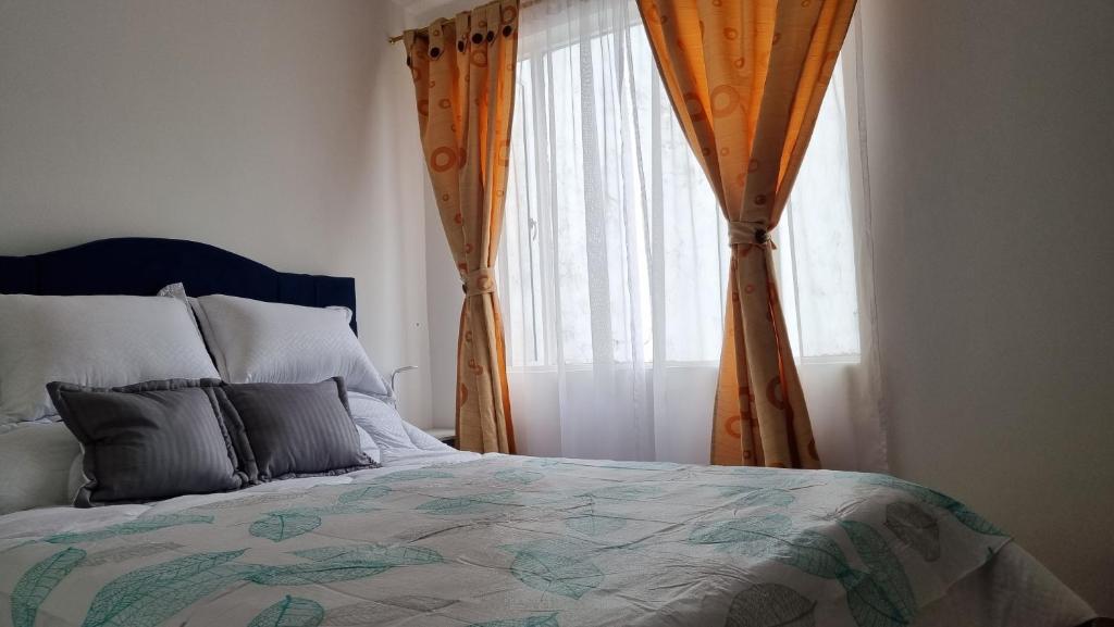 Postel nebo postele na pokoji v ubytování Casa Dohko