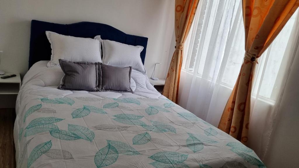 Postel nebo postele na pokoji v ubytování Casa Dohko