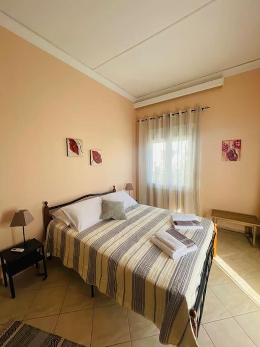 Postel nebo postele na pokoji v ubytování Bayside Apt.