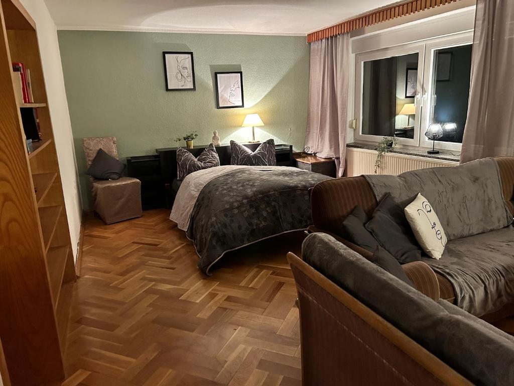 מיטה או מיטות בחדר ב-Pension FAULPELZ - Apartment