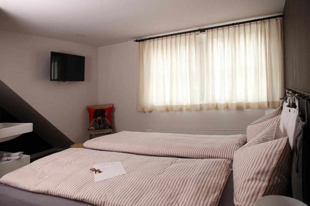 Postel nebo postele na pokoji v ubytování B&B Caffètino-Vino