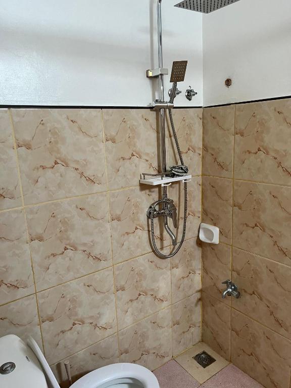 Vannituba majutusasutuses Trisha Guesthouse