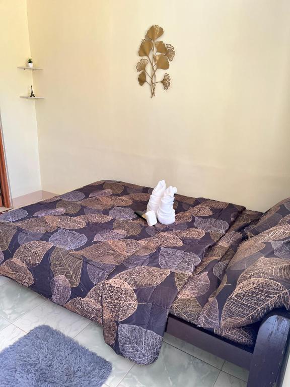 Voodi või voodid majutusasutuse Trisha Guesthouse toas
