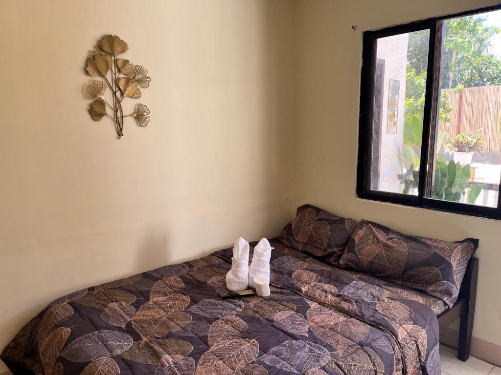 Voodi või voodid majutusasutuse Trisha Guesthouse toas