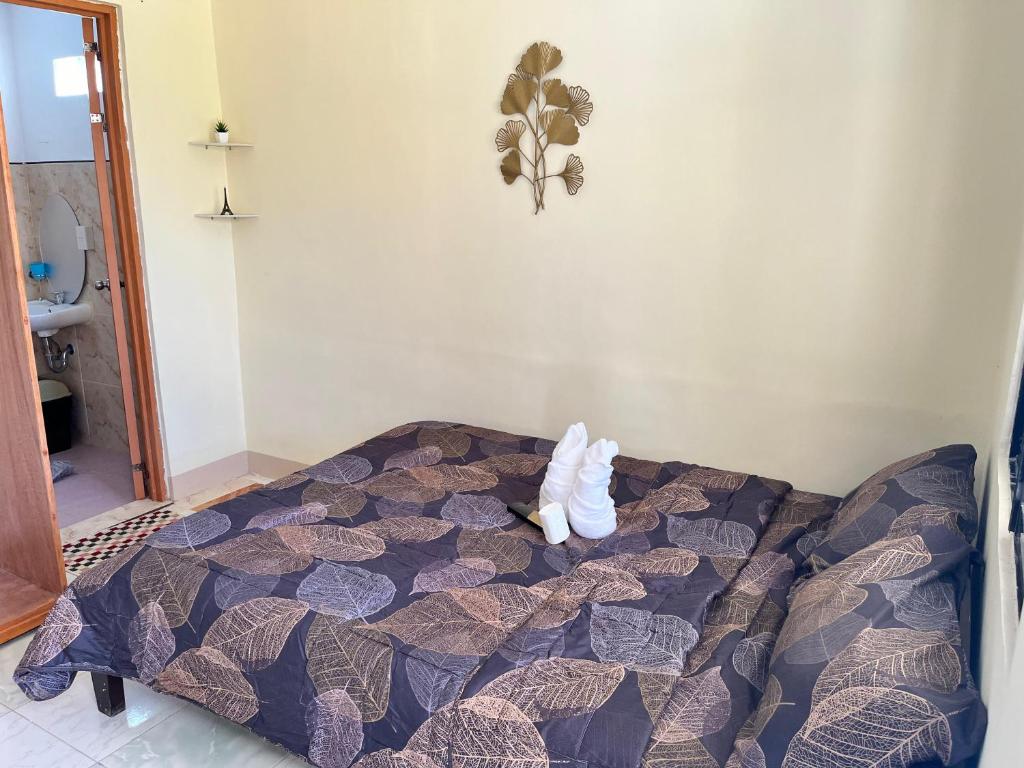 Voodi või voodid majutusasutuse Trisha Guesthouse toas