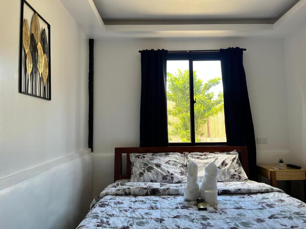Voodi või voodid majutusasutuse Trisha Guesthouse toas