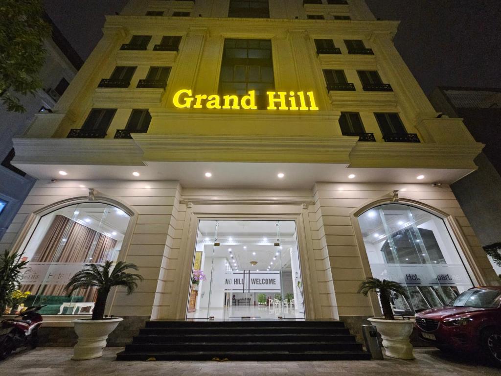 a grand hell sign on the front of a building at Grand Hill Hotel & Apartment in Hai Phong