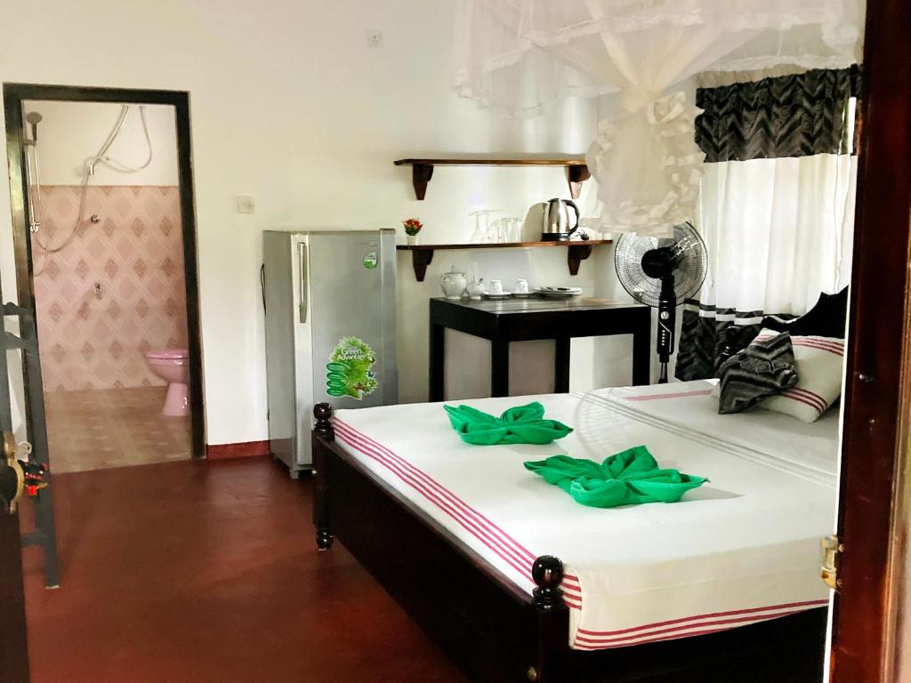 Postel nebo postele na pokoji v ubytování Meadow Cabanas