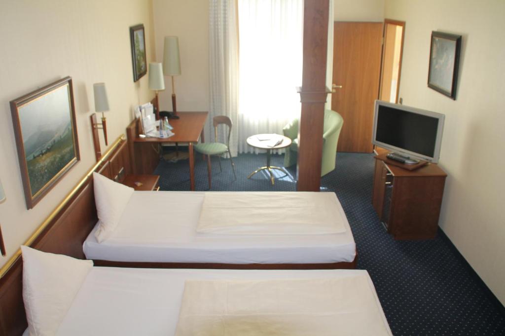 TV a/nebo společenská místnost v ubytování Victoria Hotel
