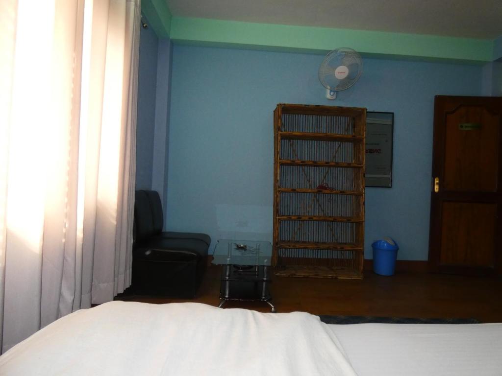 Postel nebo postele na pokoji v ubytování Sara's Backpackers Hotel