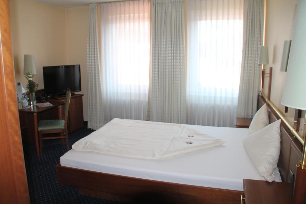 TV a/nebo společenská místnost v ubytování Victoria Hotel