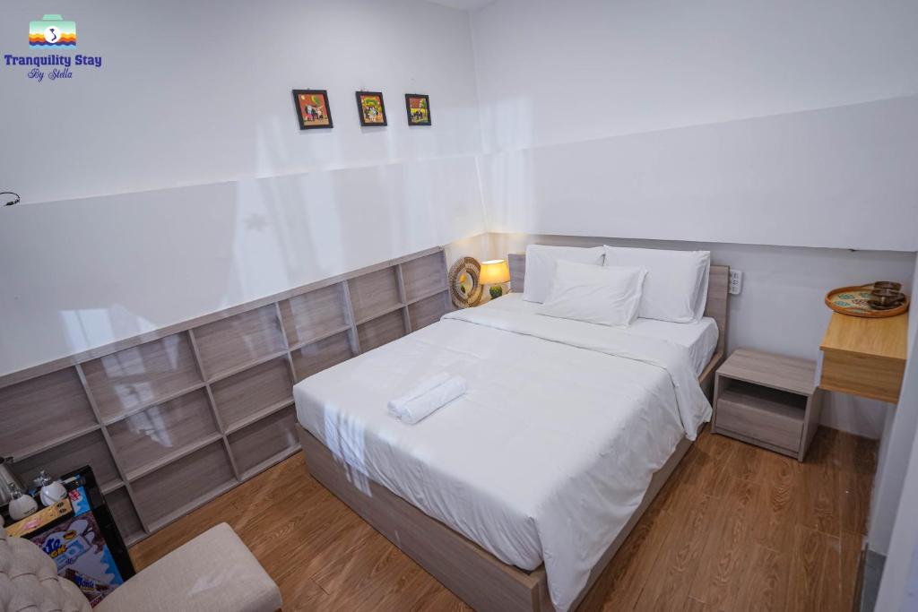 Letto o letti in una camera di Tranquility Stay Old Quarter