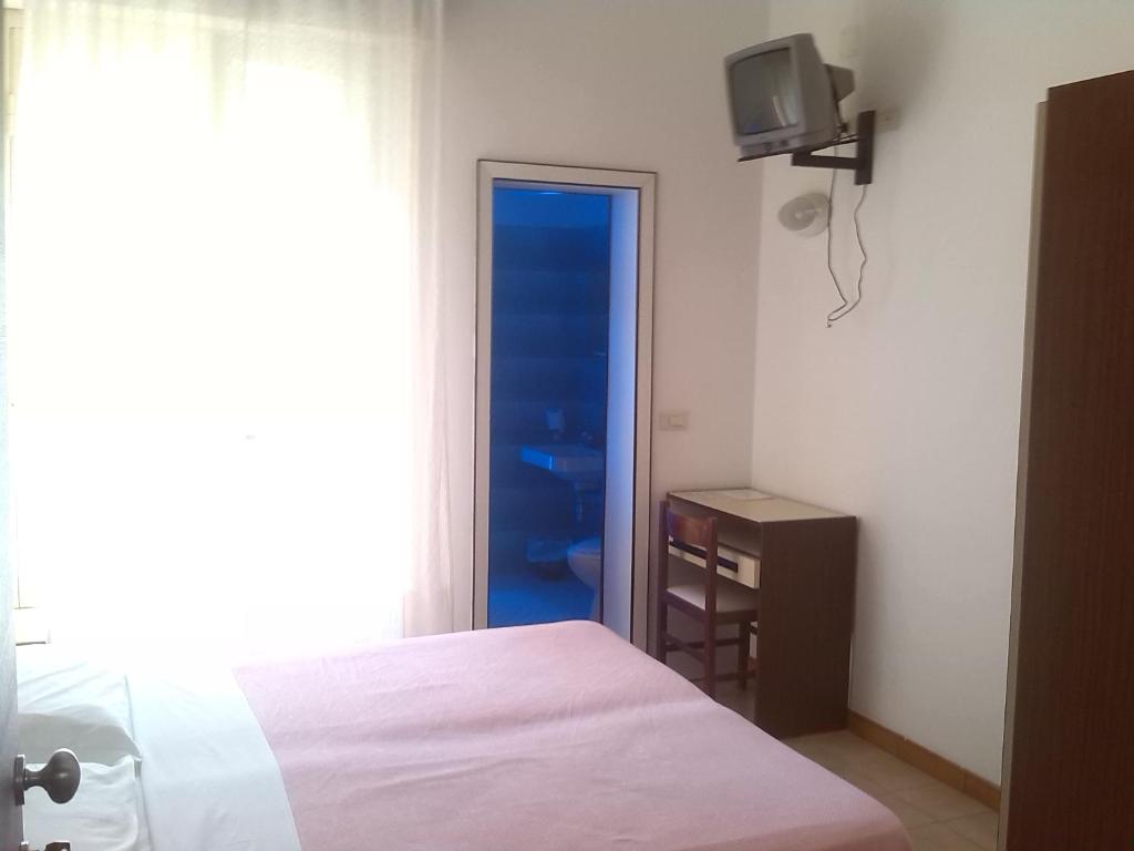 Postel nebo postele na pokoji v ubytování K2 Hotel