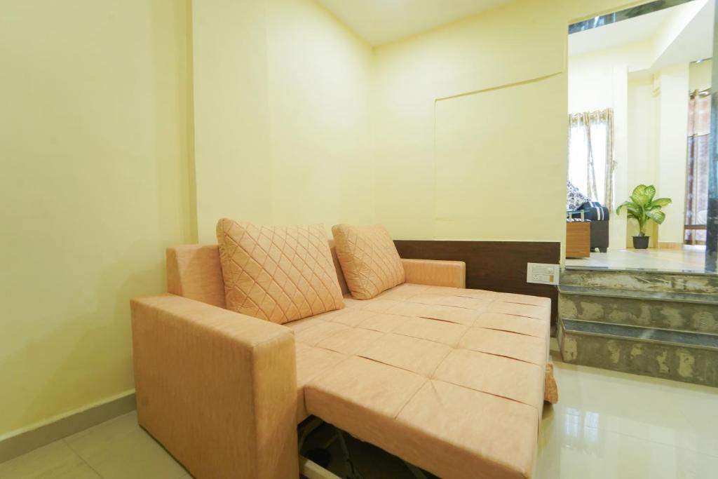 Area soggiorno di Berry Fresh Stays Mahabaleshwar With Pool