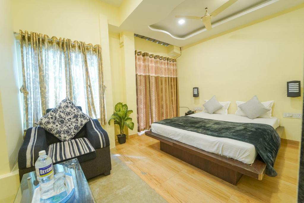 Letto o letti in una camera di Berry Fresh Stays Mahabaleshwar With Pool