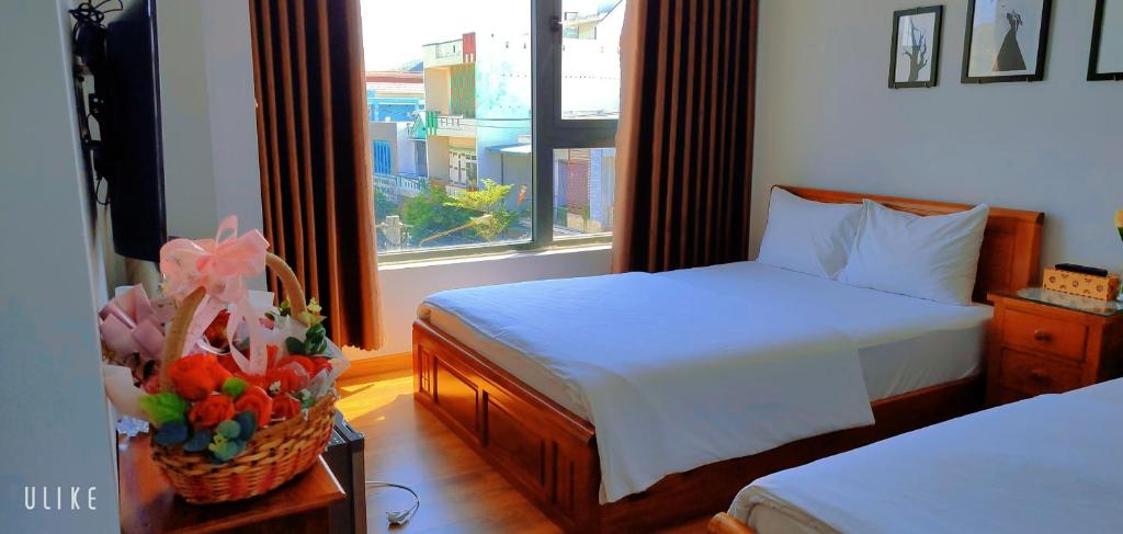 Postel nebo postele na pokoji v ubytování Việt Homestay Quy Nhơn