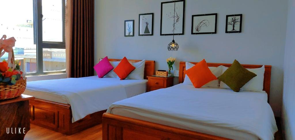 Postel nebo postele na pokoji v ubytování Việt Homestay Quy Nhơn