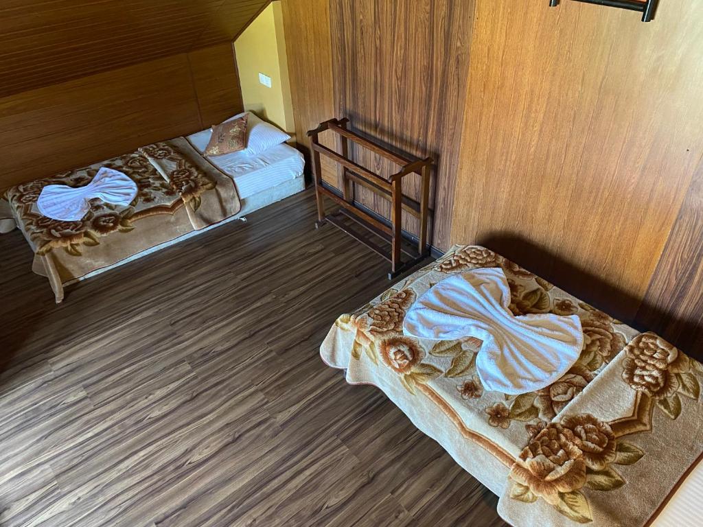 Postel nebo postele na pokoji v ubytování House of Leisure