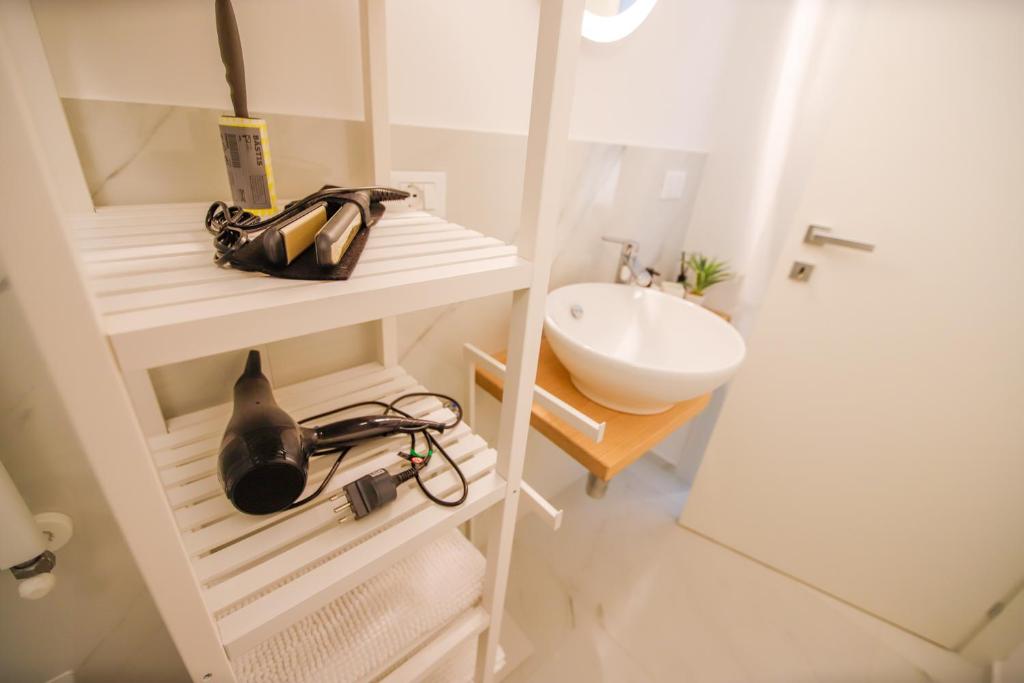 Koupelna v ubytování Moderno alloggio in zona pedonale