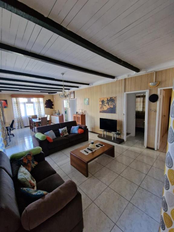 Posezení v ubytování Grande Maison atypique proche du Maïdo