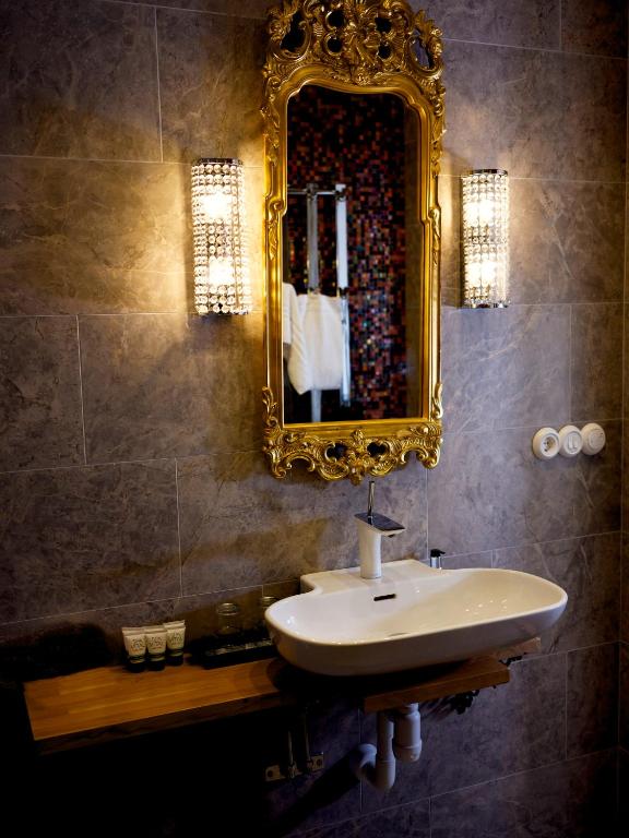 Koupelna v ubytování Grenna Hotell