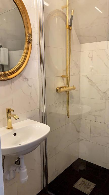 Koupelna v ubytování Grenna Hotell