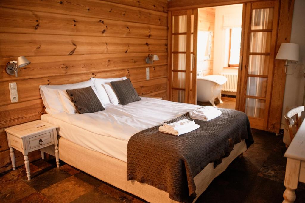 Posteľ alebo postele v izbe v ubytovaní Osada Głęboczek. Vine Resort&Spa