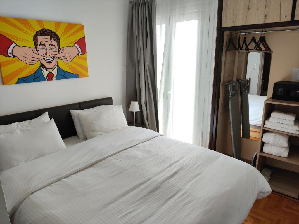 Posteľ alebo postele v izbe v ubytovaní Ulysses Apartments Acropolis