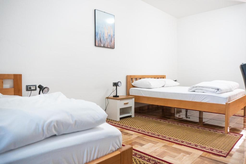 Postel nebo postele na pokoji v ubytování Hotel Europa