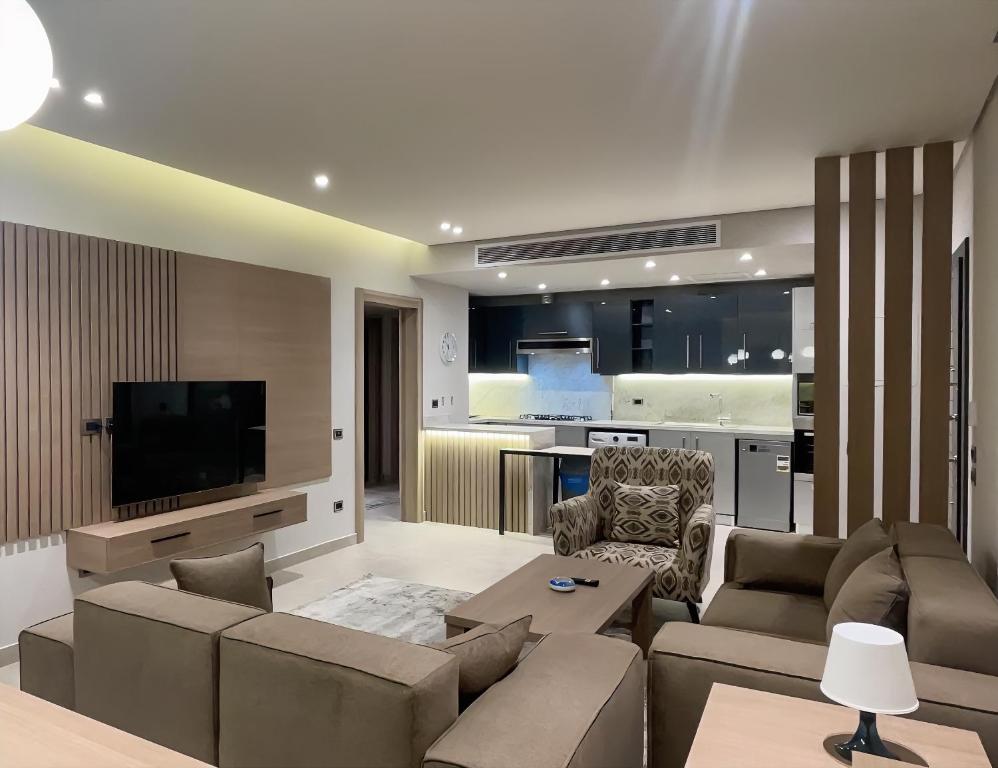 TV a/nebo společenská místnost v ubytování شقة فندقية الشيخ زايد - Zayed Suites C