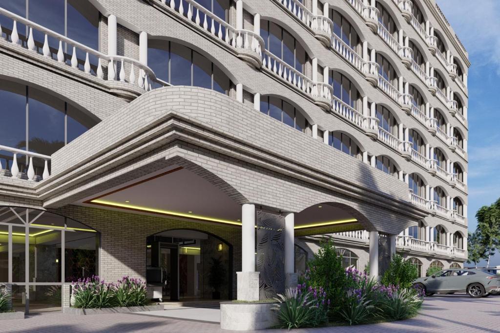 an external view of a building at Delta Hotels by Marriott Dar es Salaam in Dar es Salaam